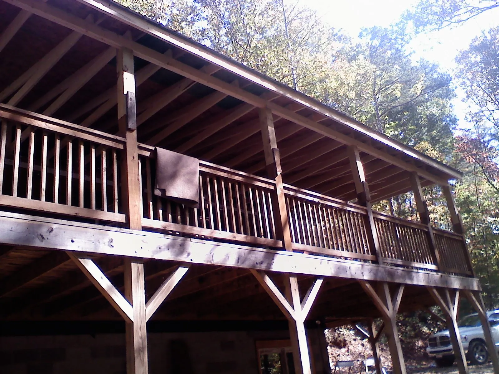 Timber framing under a new elevated porch and deck — Roof Leak Repair in Santa Cruz by Roofing Brothers